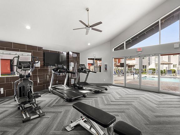 A Gym with a Variety of Equipment
