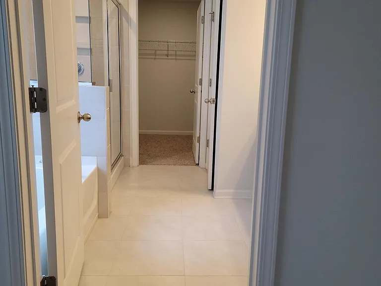 Master bathroom with walking closet