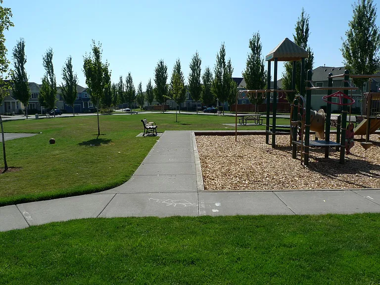 Common ground with children play structures and fields