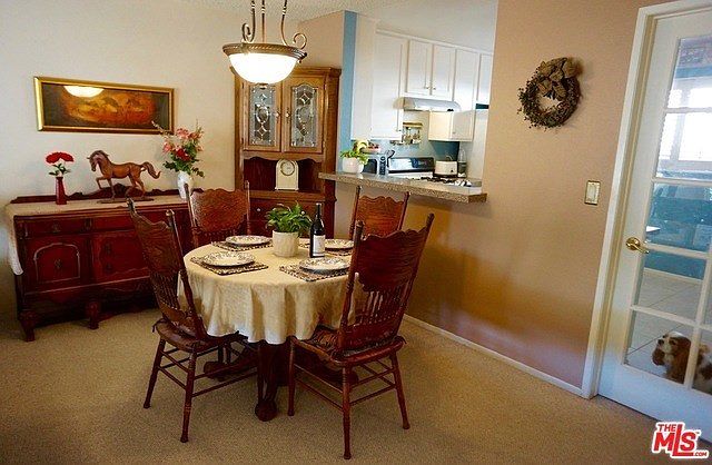 Loads of space to entertain in this open formal dinning room, French door to spacious, bright kitchen