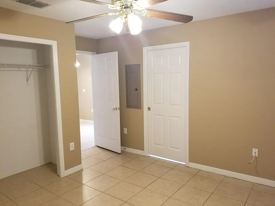 1st floor bedroom. The open door on the left leads to the Kitchen; on the right leads to the 1st floor bathroom.