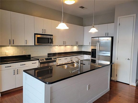 4th image of 711 Cosmopolitan Dr NE Unit 800