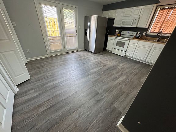 Kitchen (laundry on left in open closet)