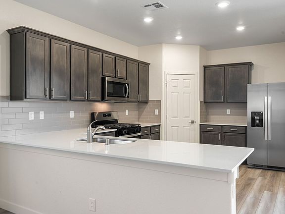A spacious breakfast bar is perfect for a quick meal.