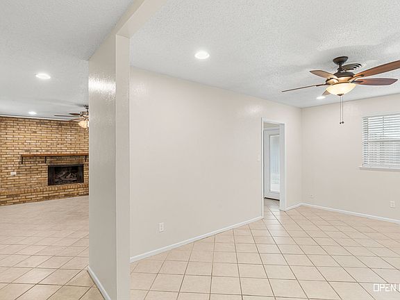 Living w/Fireplace and front Large room entry area