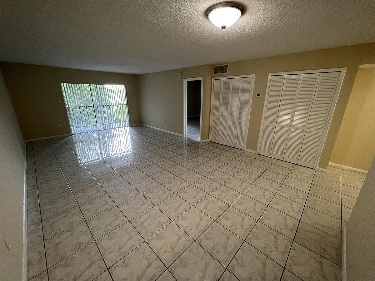 Living room - 8481 Springtree Dr #404B