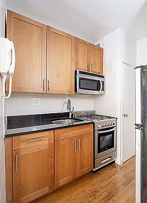 4th image of 235 E 12th St APT 5D