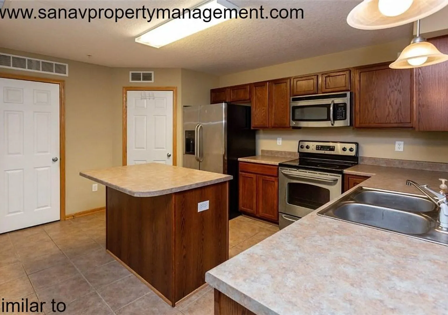 Charming 2 Bed, 1.5 Bath Townhome with 1-Car Garage in West Des Moines — Photo 3