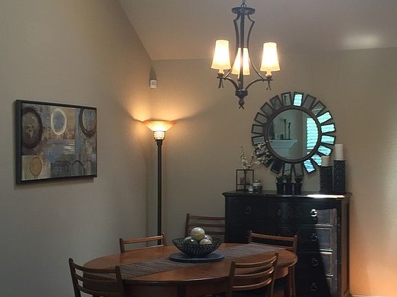 Roomy dining area with skylights
						:
						Solid hardwoods den & dining, skylight over eating area and over kitchen island