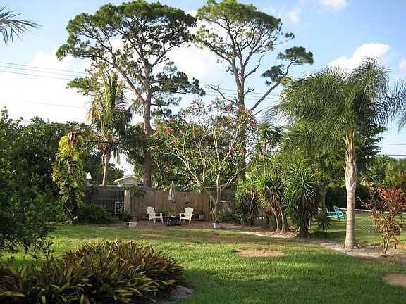 Corner of Back Yard w/ potting area behind fence