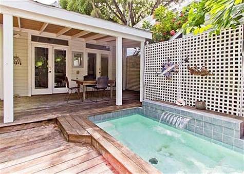 Cute little cocktail pool with waterfall.