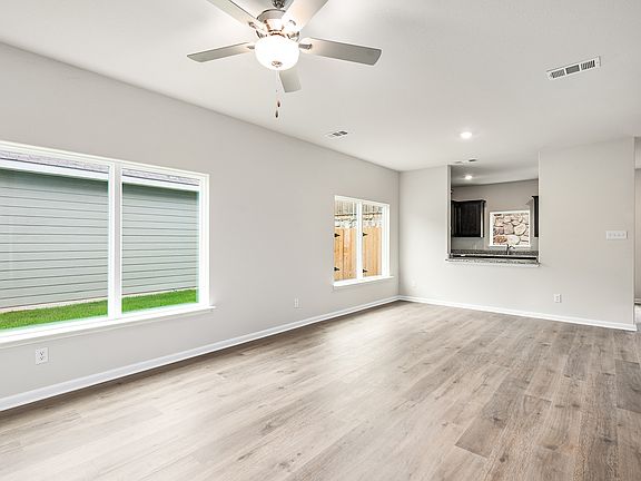 The family room has large windows that let in great, natural light.