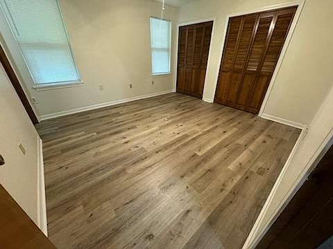 Bedroom #1 (new LVP flooring w/ two closets)
