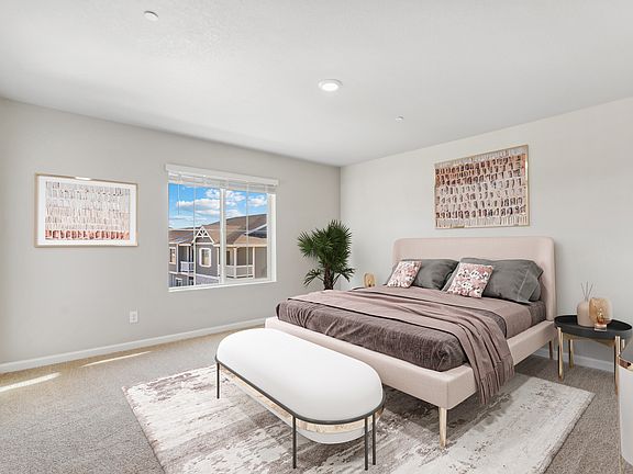 The master bedroom is the perfect place to relax at the end of the day.