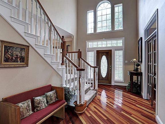 You will enter through the lead glass door to a two story entry with transom windows to let in plenty of sunlight. There has been a recent addition of Brazilian solid hard wood cherry floors with diagonal placement. There is also a quick set change l