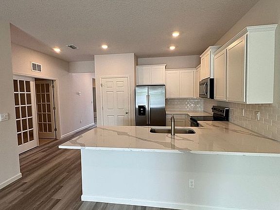 4th image of 8933 Orchid Reserve Cir #8933