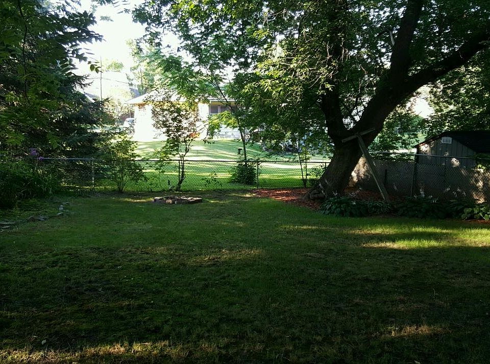 large fenced back yard is private to unit