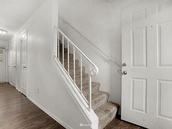 Unit 2 (Left side): Newer LVP flooring on main level