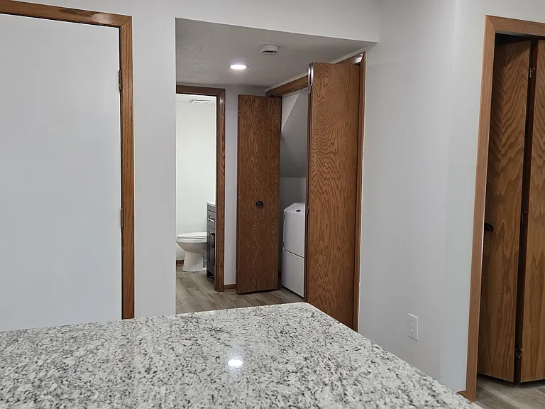 Granite counters in kitchen. Half bath off the kitchen.