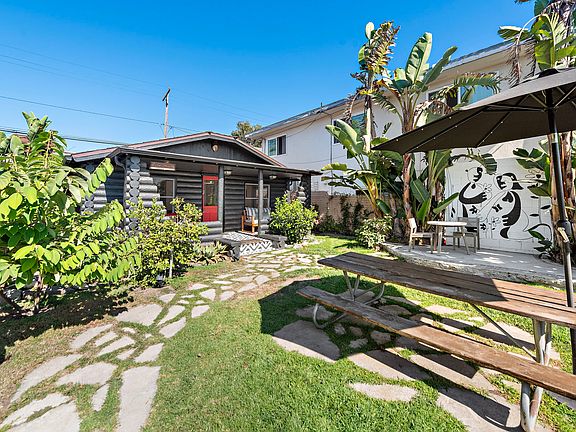 Mural by @Demit, shaded patio and deck, citrus, guava, cherimaya for the picking