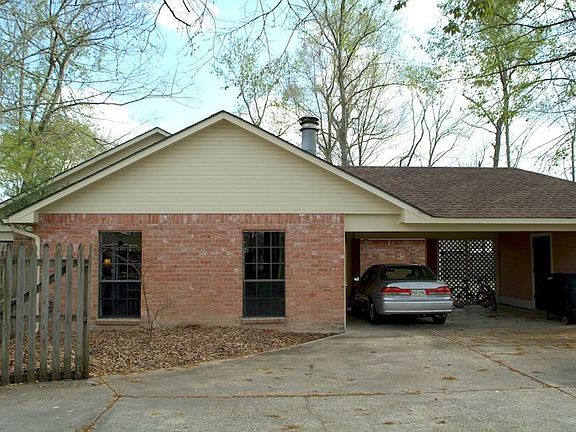 There's plenty of parking in the driveway and under the double carport.