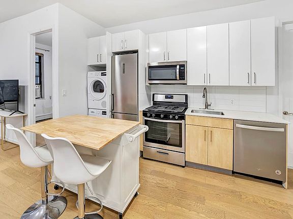 5th image of 214 E 9th St APT 1C
