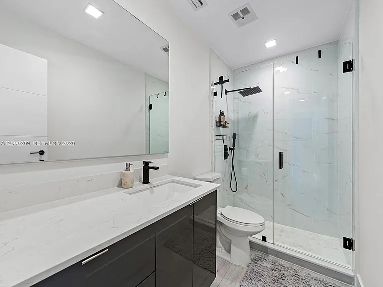 11998 SW 51st Ct — Photo 16