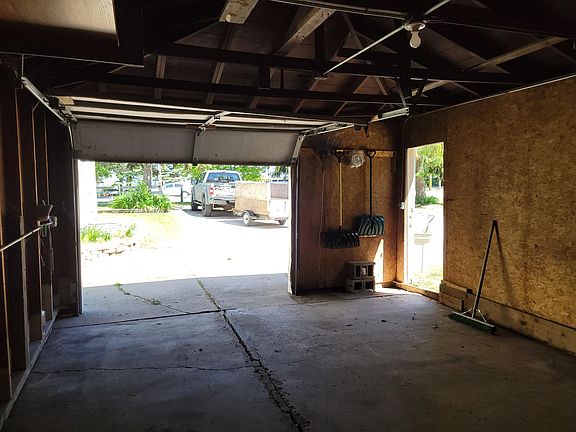 1.5 car garage. Great for storing extras.