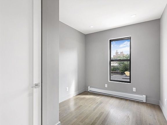 4th image of 228 E 116th St APT 7
