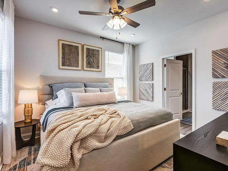 Amavi Sherrills Ford offers spacious bedrooms that accommodate king-size beds.