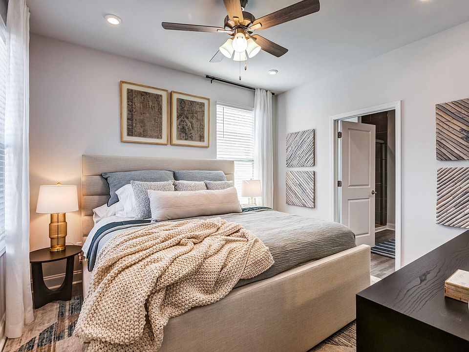 Amavi Sherrills Ford offers spacious bedrooms that accommodate king-size beds.