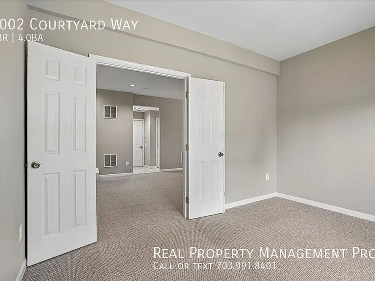 7002 Courtyard Way — Photo 30
