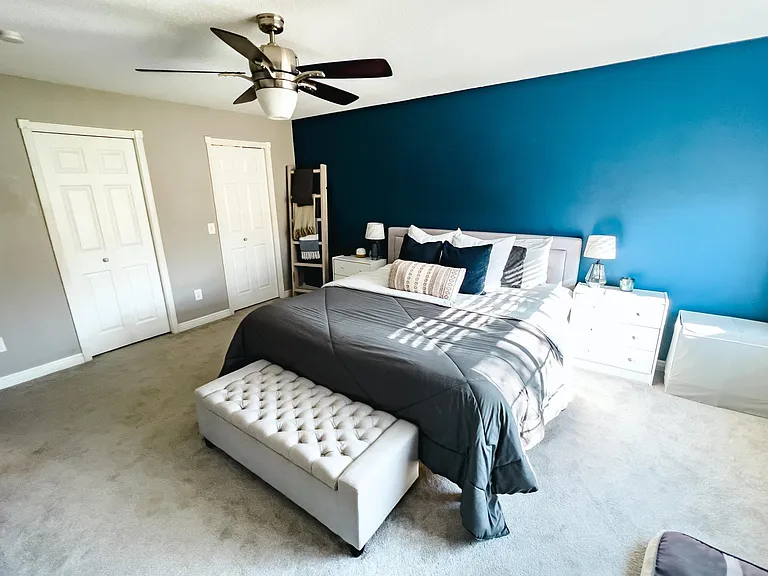 Primary bedroom. Room for king size bed, end tables, dresser, vanity - all of your furniture needs!