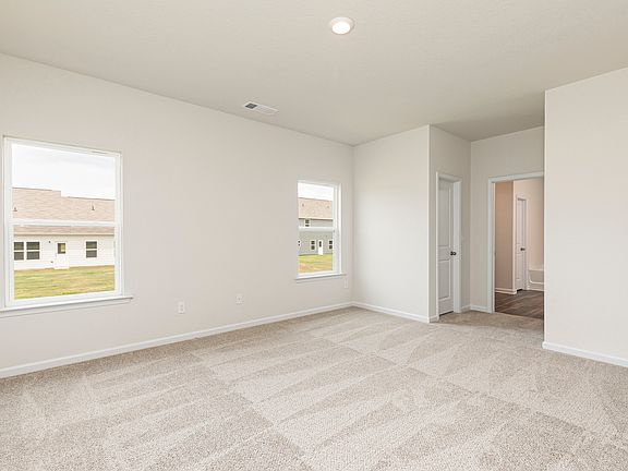 The Burton s spacious master bedroom offers plenty of bright, natural light