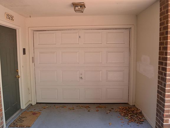 Covered access to garage and front door.