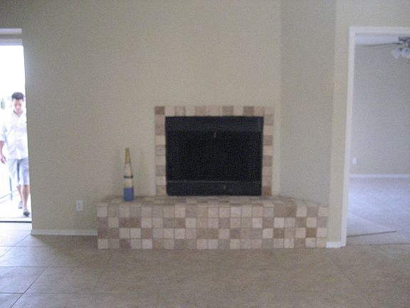 Tumbled marble fireplace