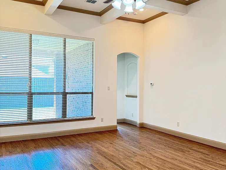 Another view of the family room showing the entrance to the master bedroom
