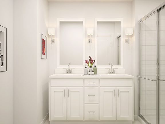 Primary bath with white vanity