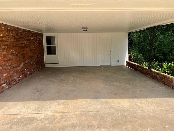 Carport (fits two cars) extra parking out front