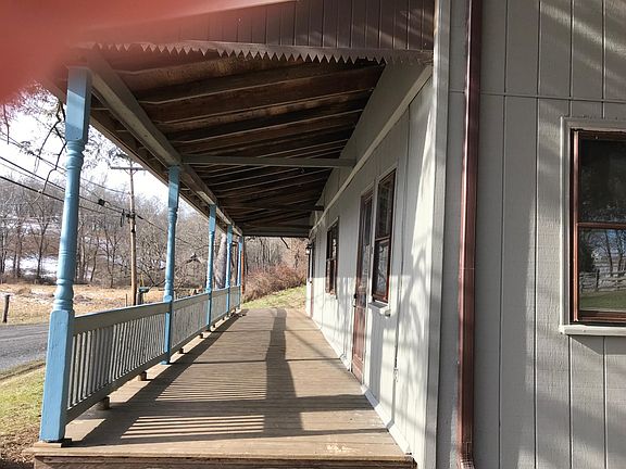 Long front porch for relaxing on those lazy days of summer