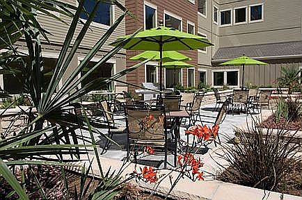 Peaceful east courtyard to enjoy time with pets and neighbors