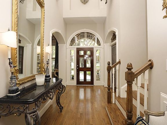 Grand Entrance,paneled study off entrance