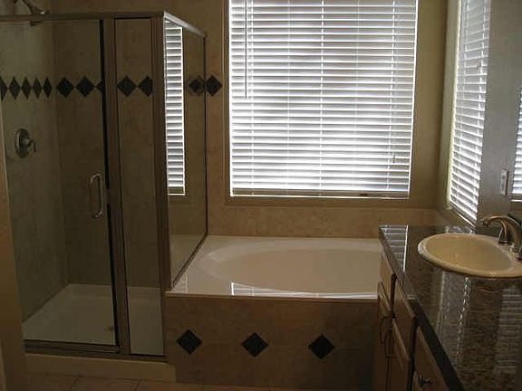 Master bath w/ new tile shower & tub surround