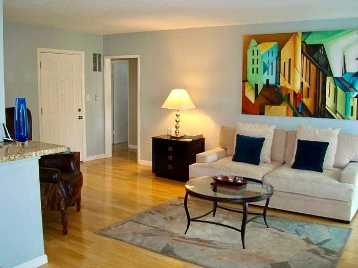 Large living room with dining area and space for an office area. This is how your place could look furnished.