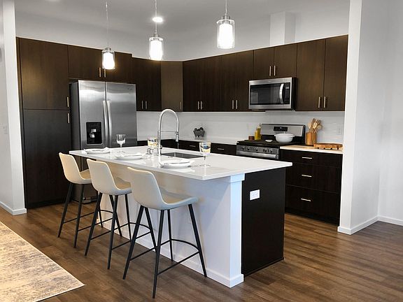 The kitchen offers new Whirlpool appliances and a gas range.
