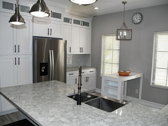 New quartz counters throughout