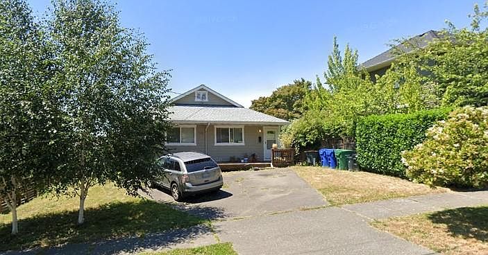 Street view of front. Unit 1 is on the right (north side).