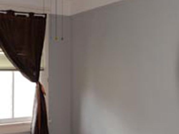 3rd image of 7718 Willow Street # Top Floor