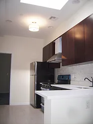 Rented by Perry Associates NYC Inc