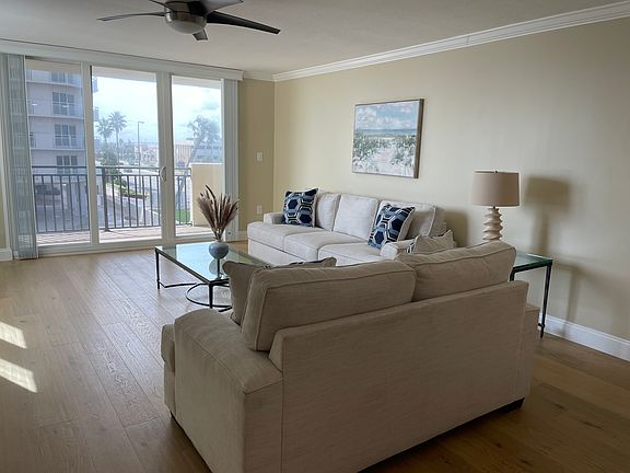Main room - includes flat screen TV on wall opposite couch